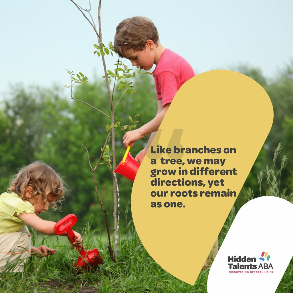 Image of Children watering a branch of tree and displaying inspirational quotes