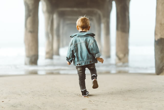 a kid with autism observing his steps | Understanding Elopement in Autism: Risks and Prevention