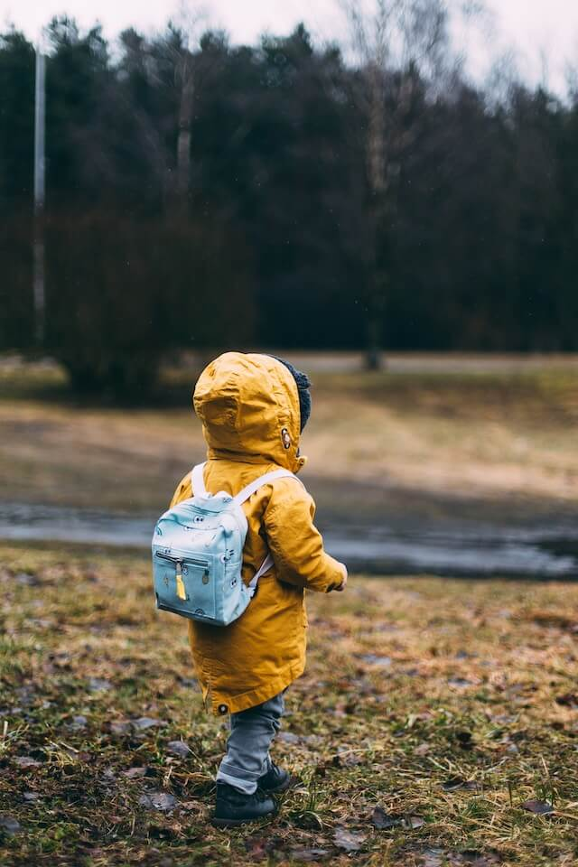 a child with autism walking in the park | Understanding Elopement in Autism: Risks and Prevention
