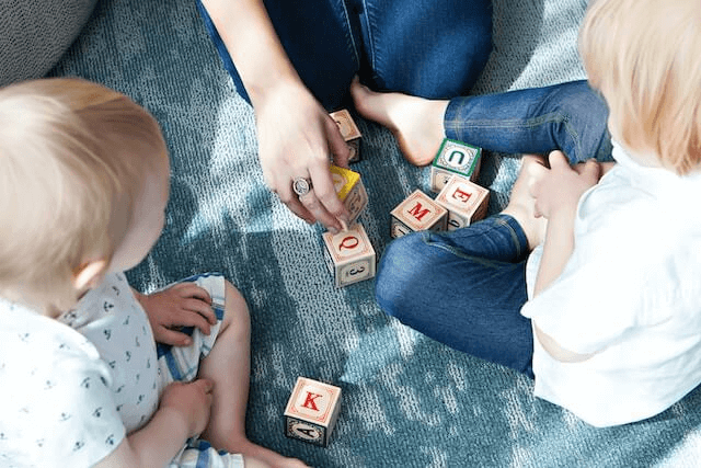 the children was learning the letter puzzle | Unlocking Potential