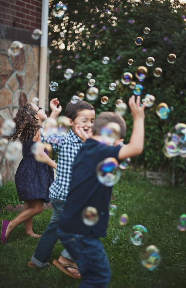 3 kids with autism were playing with each other.